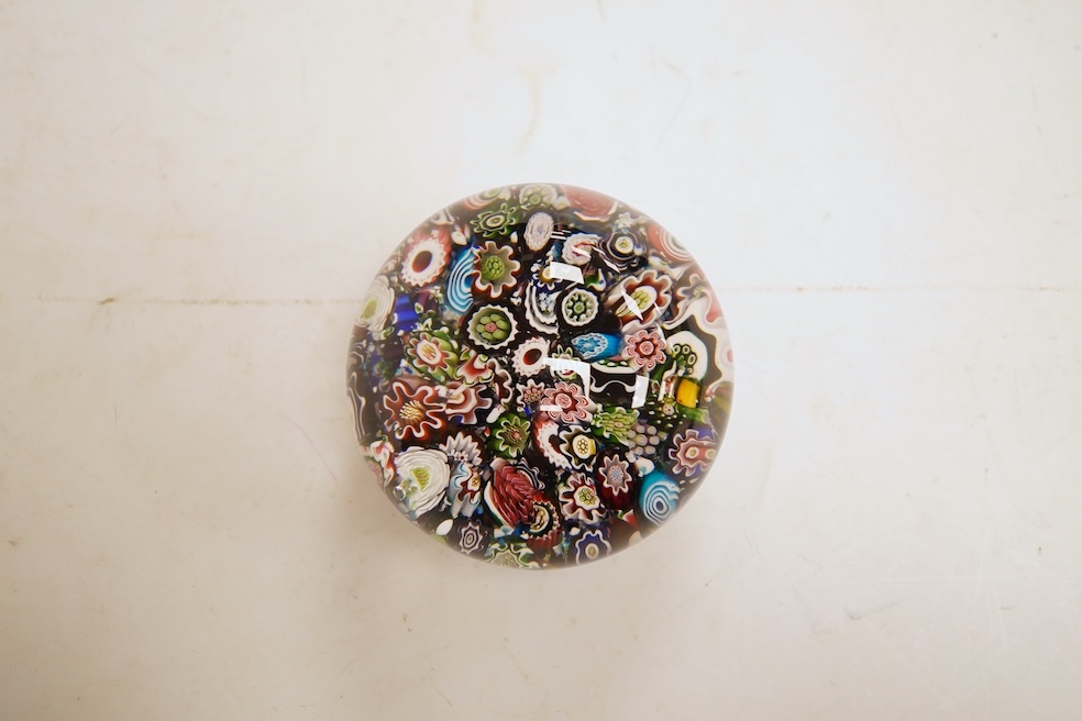 A Clichy millefiori paperweight, 7cm in diameter